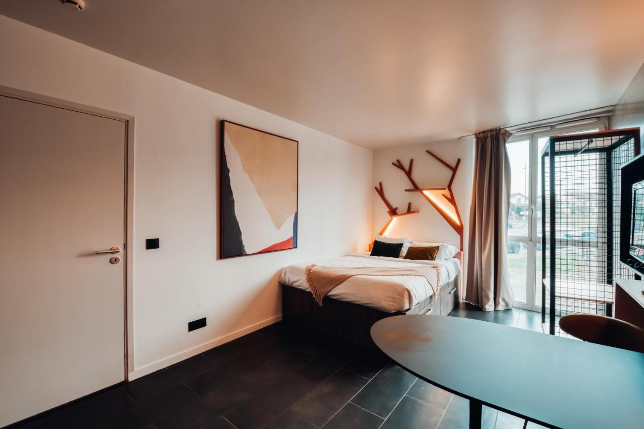 Cowool Cergy Aparthotel Exterior photo